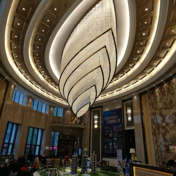 Large leaf-shaped ceiling feature with nested illuminated outlines