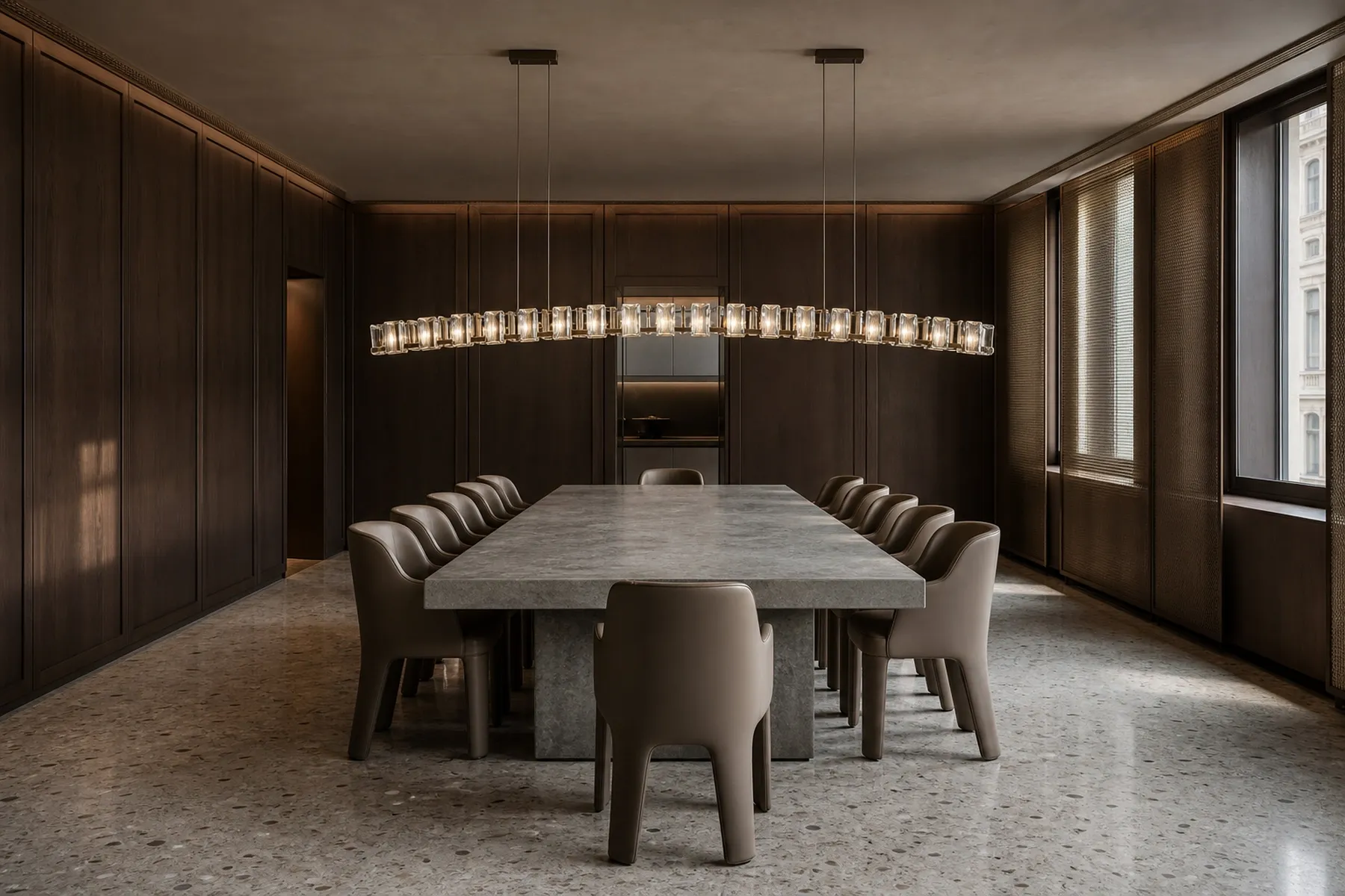 Walnut Milan dining salon with a low arched chandelier of 24 crystal modules